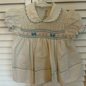 6-9 month dress. Never worn